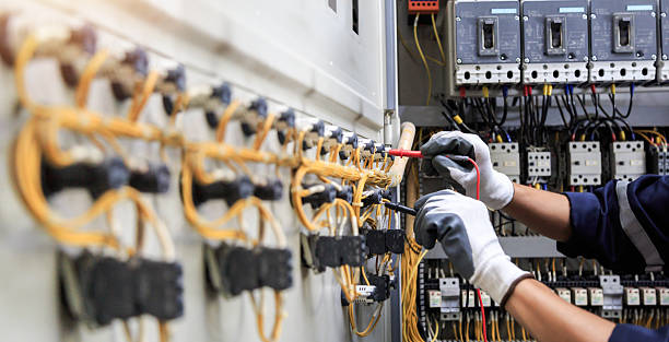 Professional Electrician technician working in Highland, IN